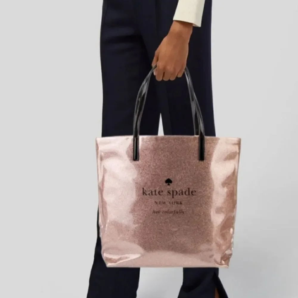 KATE SPADE NewYork/Rose Colored Glittered Tote with Black Handles and Accent